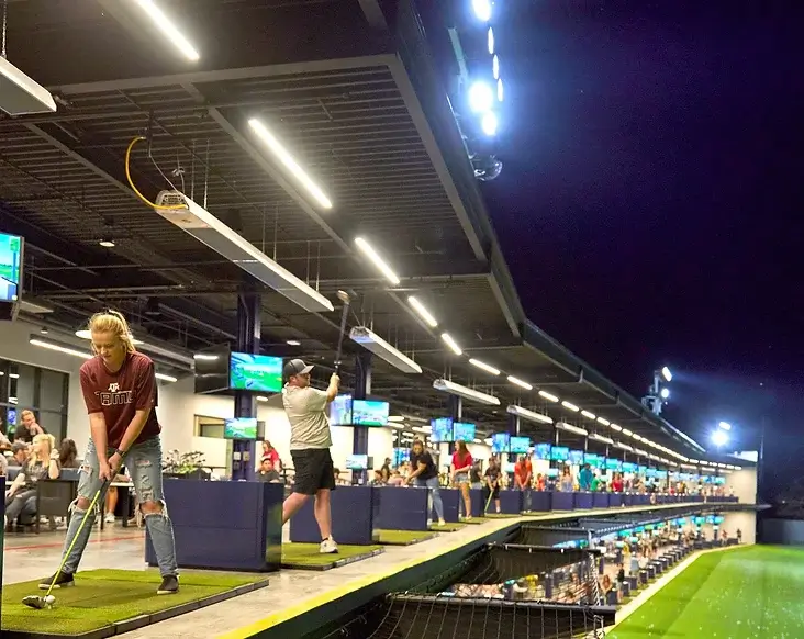 People enjoy playing golf outside