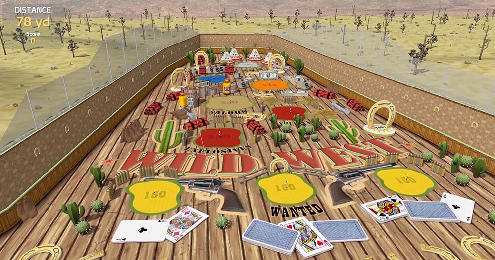 A pinball game with a table and numerous cards spread across it.