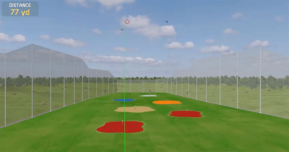 Golf simulator with green field and ball.